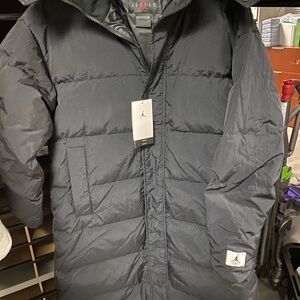 Jordan Flight Women's Therma-FIT Oversized Down Parka.